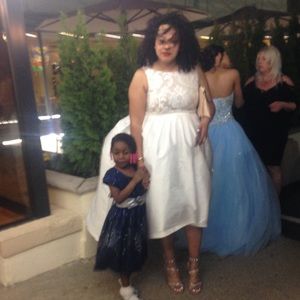 Woman’s dress size 14